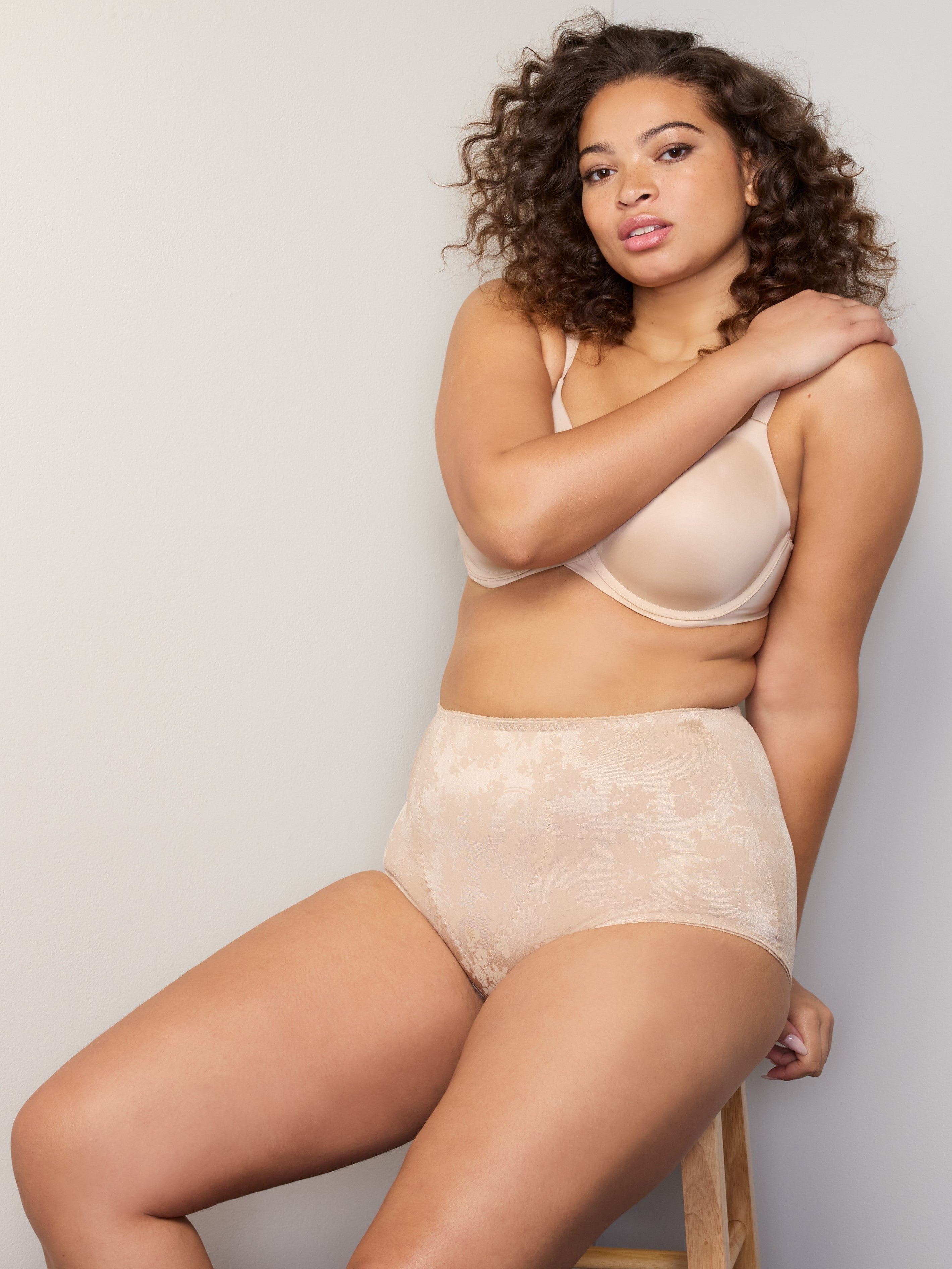 woman wearing a beige bra and shaping brief