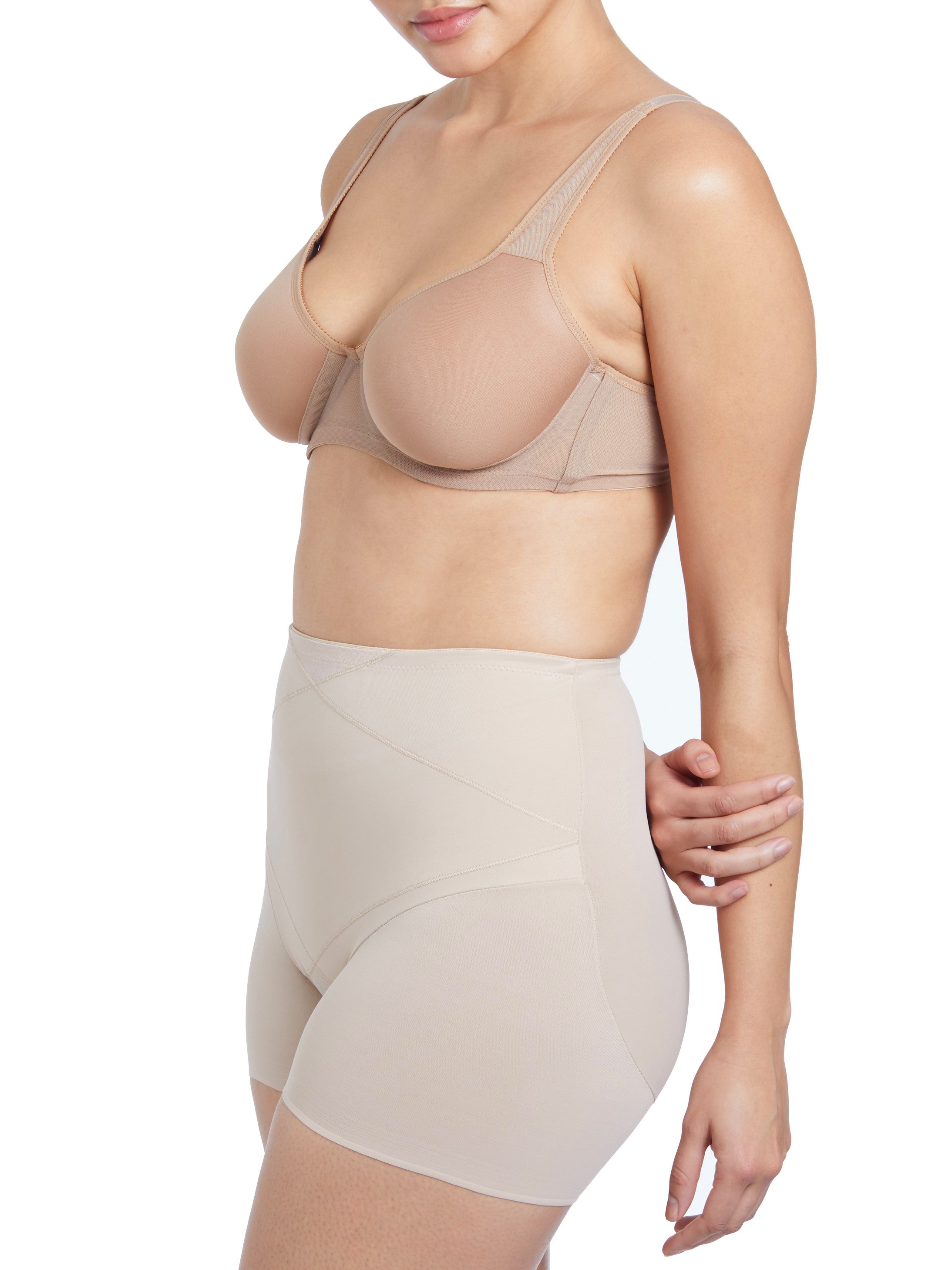 woman wearing a beige bra and shaping brief